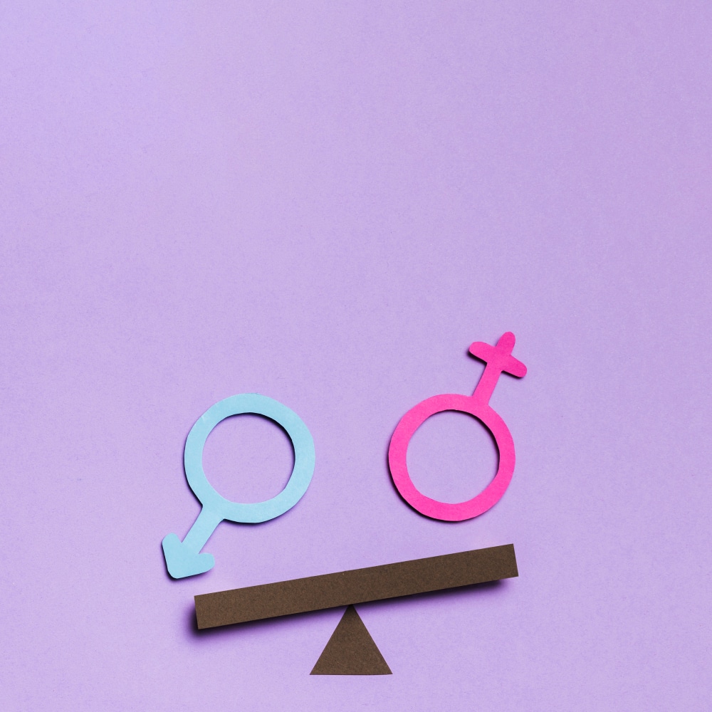 Two gender symbols side by side, representing gender bias in performance reviews.
