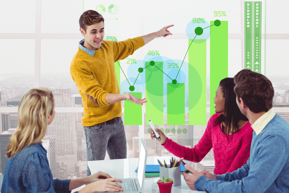 Team discussing growth metrics in a high-performance workplace setting.

