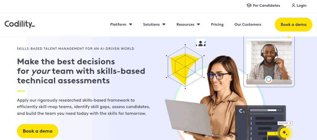 Codility homepage promoting skills-based technical assessments with an image of a smiling woman using a laptop, a man on a video call, and graphical elements representing skill-mapping