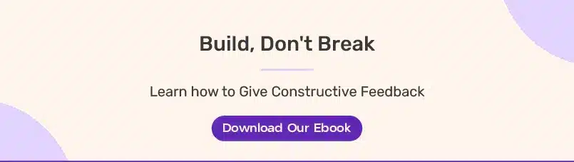 Guide to Giving Constructive Feedback Banner with the headline "Build, Don't Break" and subtext "Learn how to Give Constructive Feedback," featuring a purple button labeled "Download Our Ebook" on a soft beige and purple background.